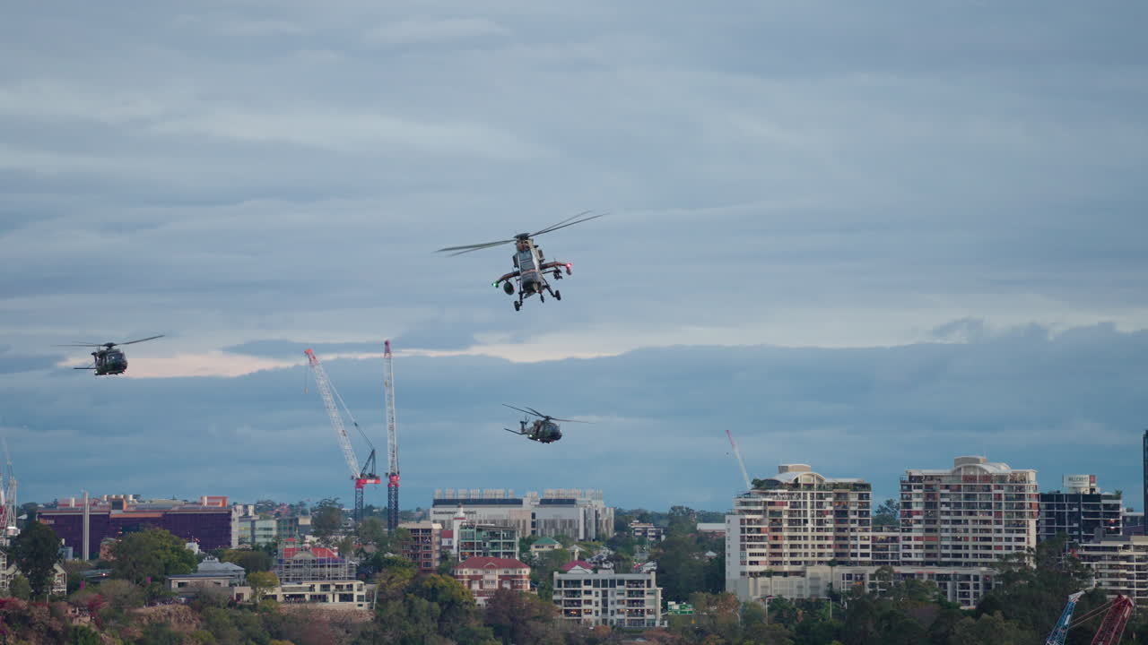 Convoy Of Military Helicopters Flying Over Brisbane City During Riverfire, 4K Slow Motion