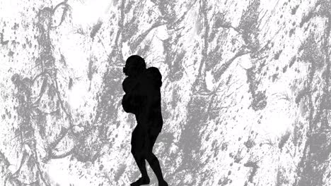 animation of silhouette of male american football player over shapes on grey background