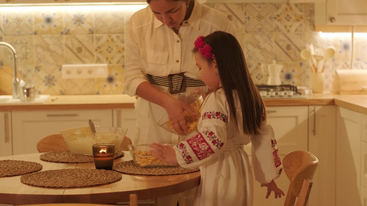 Mother and Daughter Preparing for Christmas Celebration