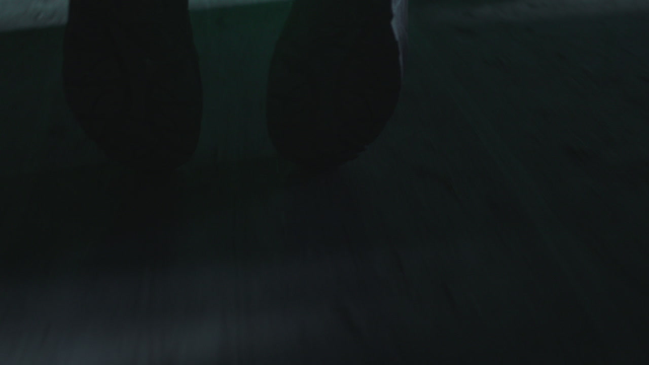 A wounded soldier in the abandoned military complex approaches anomaly