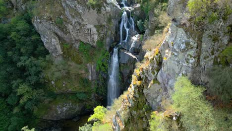 Aerial-View-Of-Fresh-Water-Flowing-Through-The-Toxa-Waterfalls-in-Silleda,-Pontevedra,-Spain