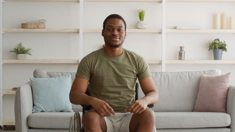 man in wheelchair showing strength and positivity