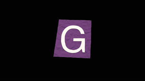 crumpled purple paper with the letter g