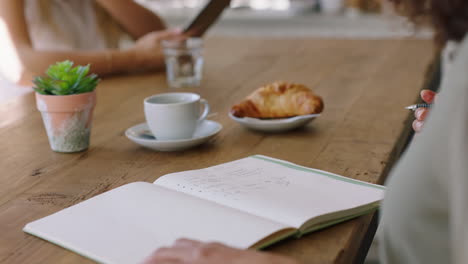 hands writing, coffee shop owner