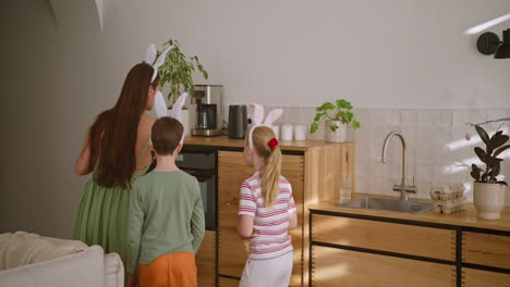 kids preparing easter treats in the kitchen