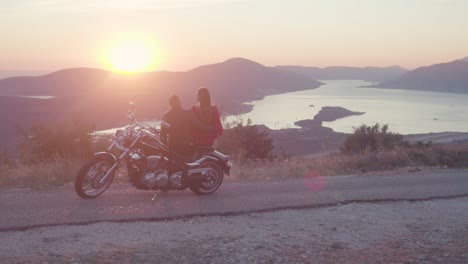 sunset motorcycle ride with couple