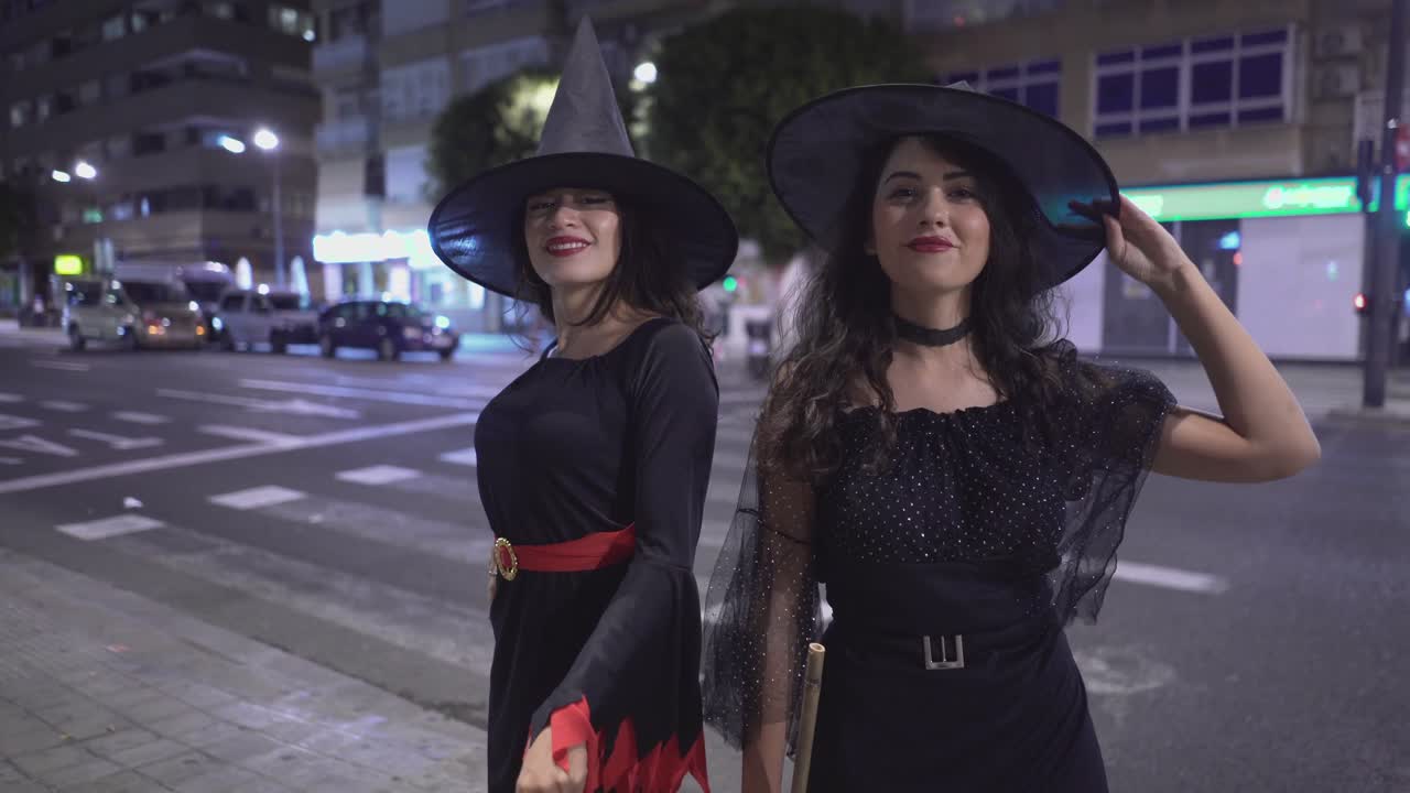 Two Witches Having Fun on Halloween Night