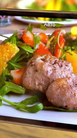 food on a tablet screen and reflection