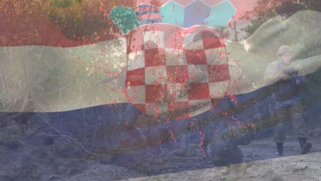 Animation-of-digital-fireworks-exploding-and-croatia-flag-waving-over-army-soldiers-with-guns-in-war