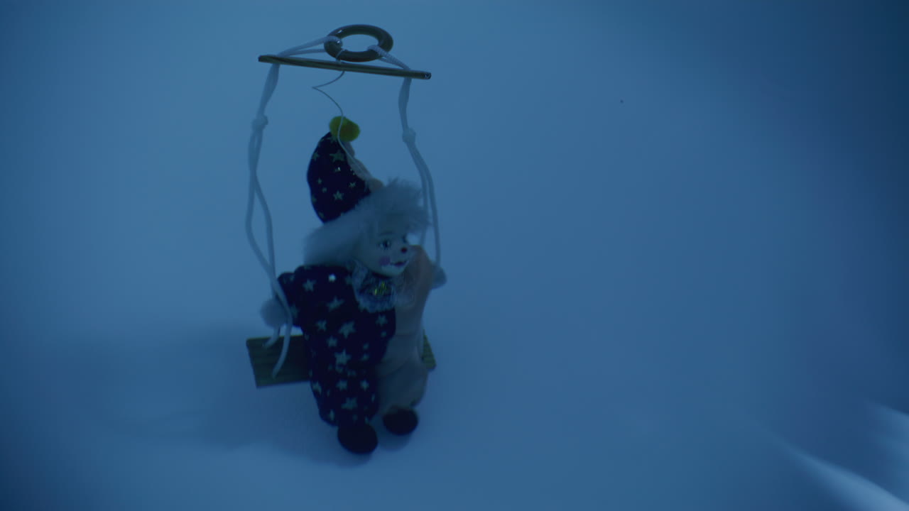 Vintage Clown Puppet on a Swing