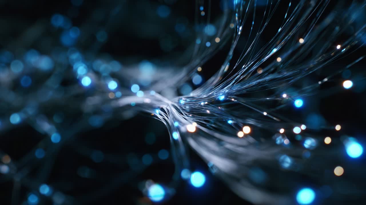 A mesmerizing visual exploration of luminous strands and vibrant particles, showcasing a dynamic interplay of light and movement that captures the essence of digital energy and creativity in a captivating abstract scene