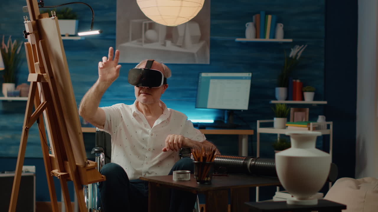 Old person with disability in wheelchair using vr glasses