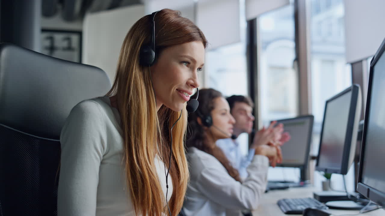 Beautiful operator helping client in office. Professional sales manager talking