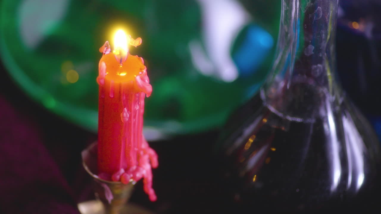 Mystical Illumination: Renaissance-Style Table with Red Candle