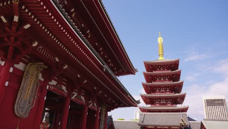 Asakusa-Shrine-in-Tokyo,-Red-Pagoda-and-Temple-on-Sunny-Day-in-Japan