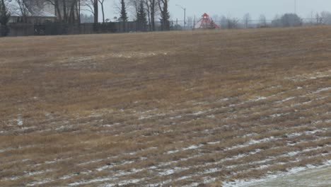 Snow-blows-through-a-field