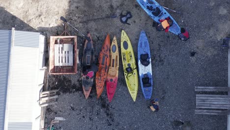 guys unloading kayaks after returning from adventure trip in iceland, top down