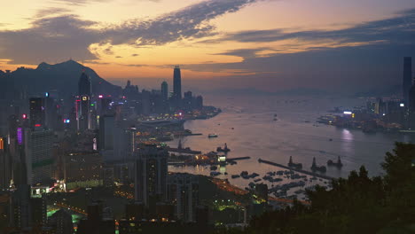 High-view-overlooking-Victoria-Harbour-including-both-Hong-Kong-island-and-Kowloon-at-dusk