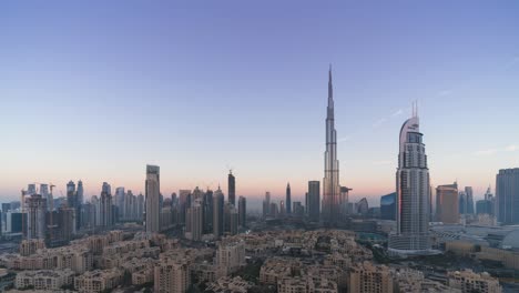 4k timelapse - city skyline and cityscape at sunrise in dubai. uae