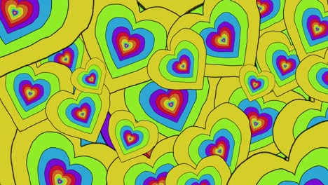 animación de corazones arco iris pulsantes en el fondo.