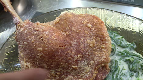crispy duck leg with creamy spinach