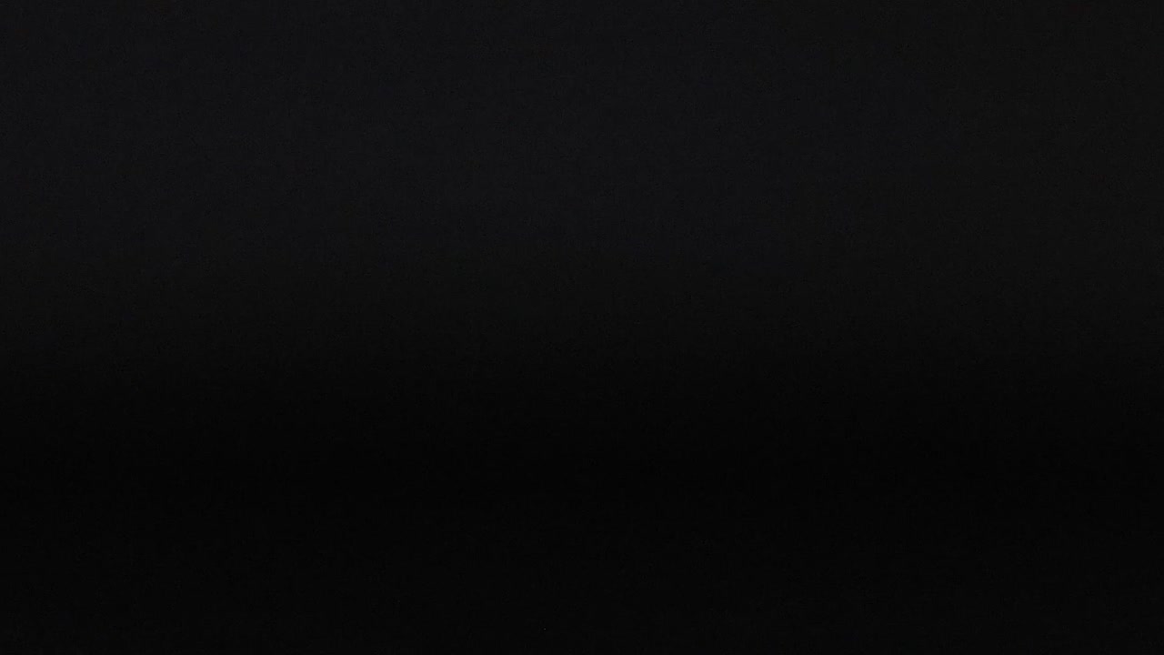 A purple sphere moves smoothly across a dark, empty background in a series of frames.