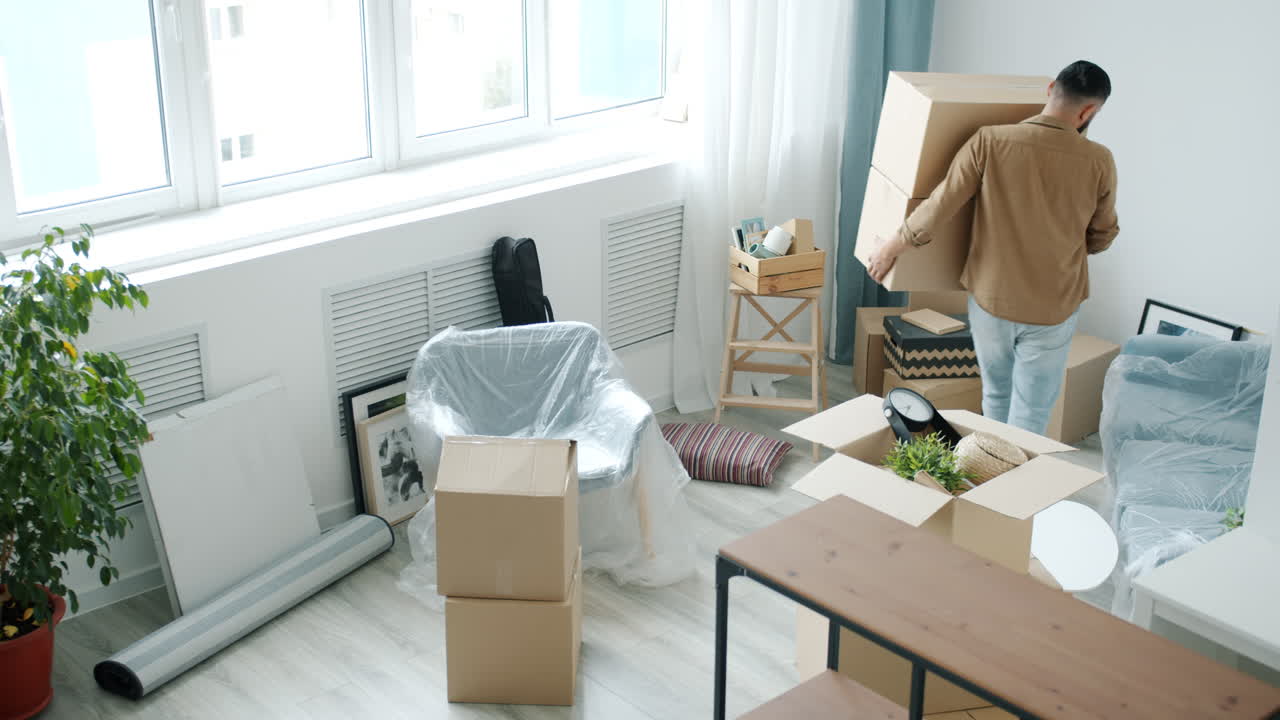 Man moving into a new apartment