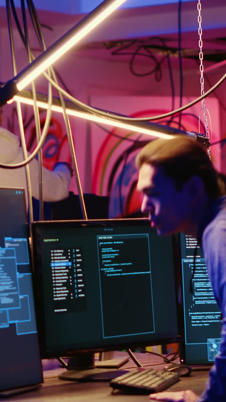 Vertical video Hackers leaving underground hideout