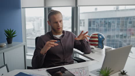 Modern-freelancer-talking-laptop-online-flat-close-up.-Man-having-computer-call