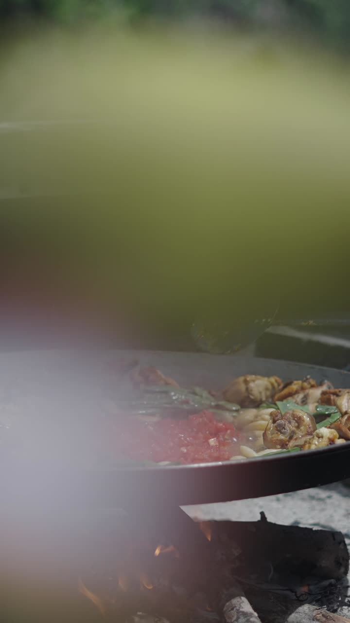 Paella Cooking over a Campfire