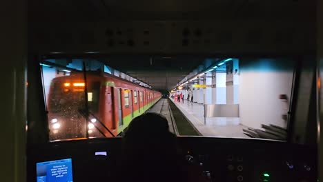 mexico city subway route on its new line, arriving at a station on sunday morning, with few people