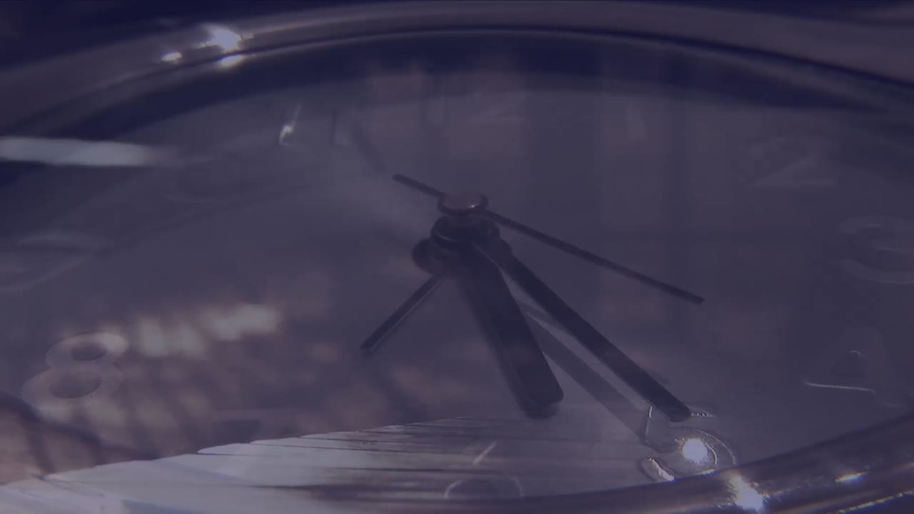 Animation of clock over walking people walking on the street