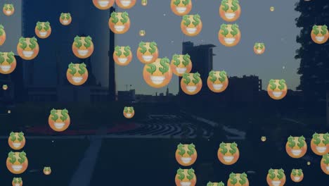 Animation-of-emoticons-blinking-over-cityscape