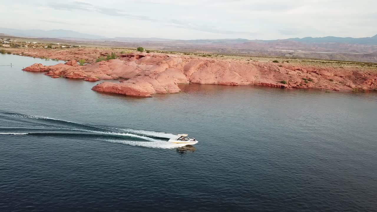 Aerial View of Boat in Water Reservoir Lake of Sand Hollow State Park, Utah USA