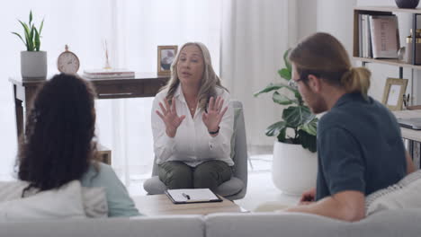 young-interracial-couple-arguing-during-a-therapy