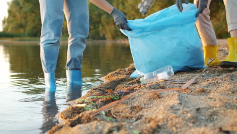volunteers cleaning up riverbank