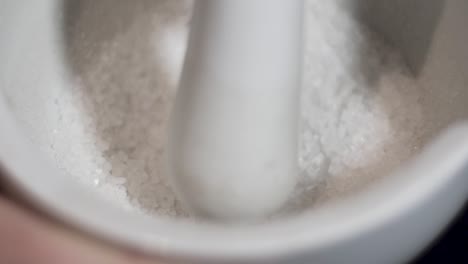 slow motion close up shot of crushing salt crystals