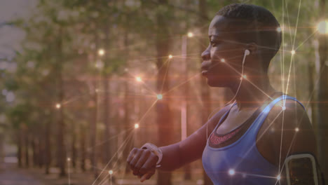 Animation-of-network-of-connections-over-woman-exercising-in-forest