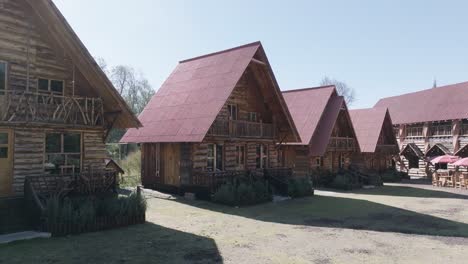 Backwards-Shot-Of-Number-Of-Unique-Wooden-House-Cottages,-Mexico