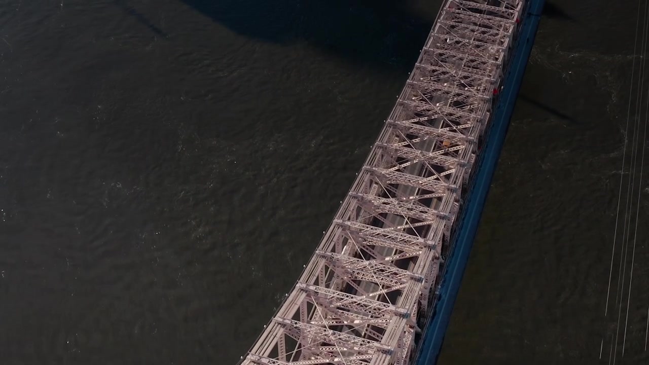 View of Queensboro Bridge over East River in New York from above