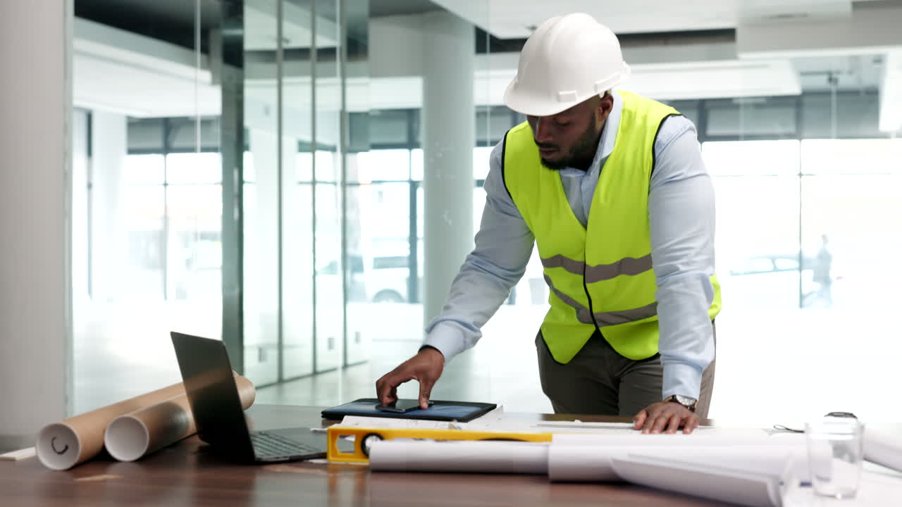 A male engineer talking on the phone