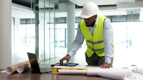 a male engineer talking on the phone