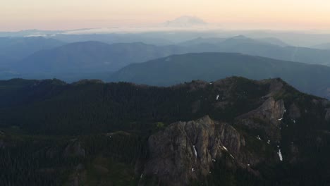 aerial over stunning mountain range of mount rainier national park during dusk