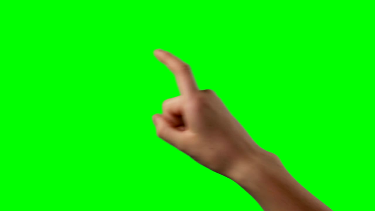 persona haciendo un gesto de la mano contra el fondo de la pantalla verde