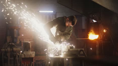 metalworker grinding metal in a workshop