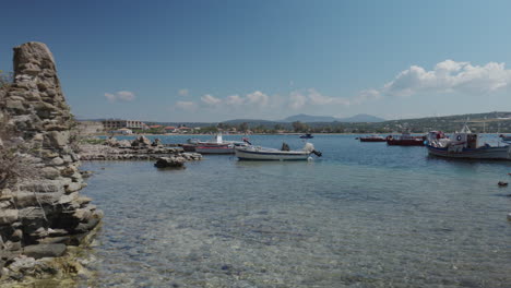 small harbour with boats in greece