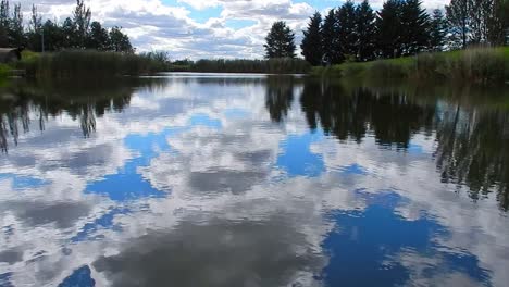 blue lake water mirror reflection tranquillity bright scenic cloudy sky