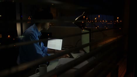 male executive working on computer at desk 4k