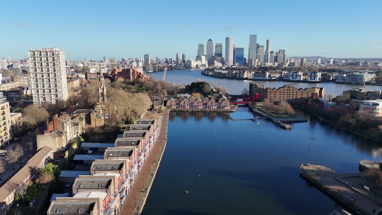 Pull back drone aerial reverse reveal Shadwell Basin East London UK