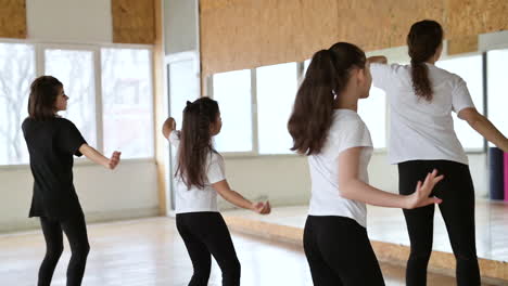 teacher and pupils in dance class